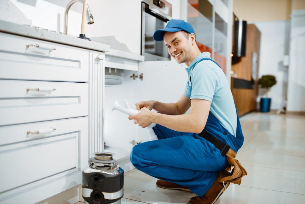 smiling male plumber